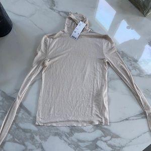 Urban Outfitters cream turtleneck